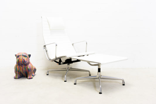 Vitra Eames Aluminium Chair EA 124 mit Hocker